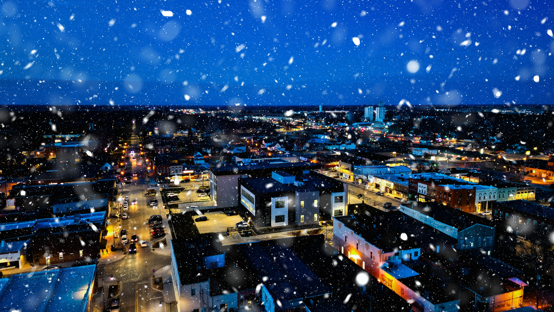 Aerial view of Downtown Indianola Square with a snow effect layered over it.