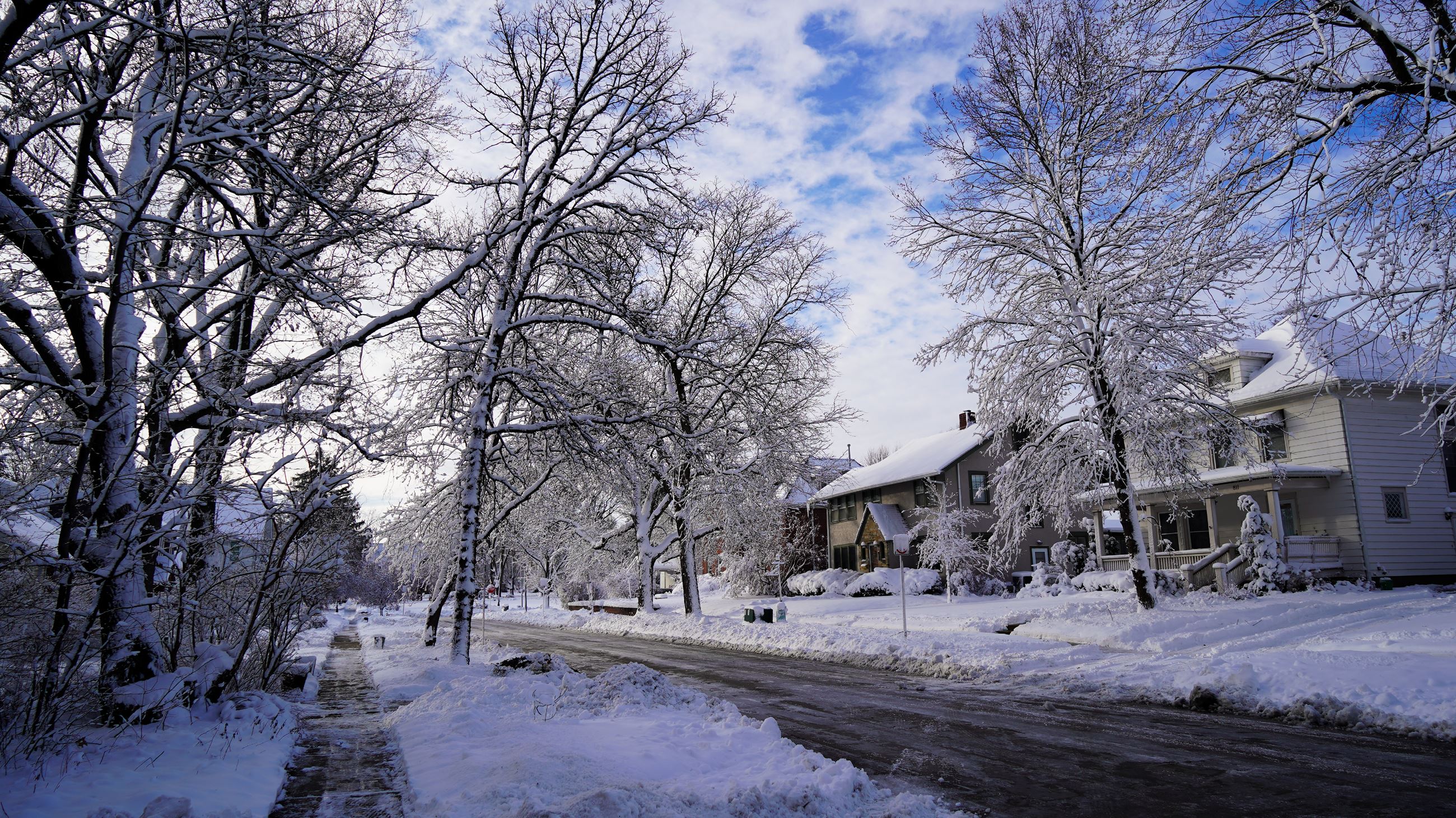 Snow-covered homes in Indianola, Iowa