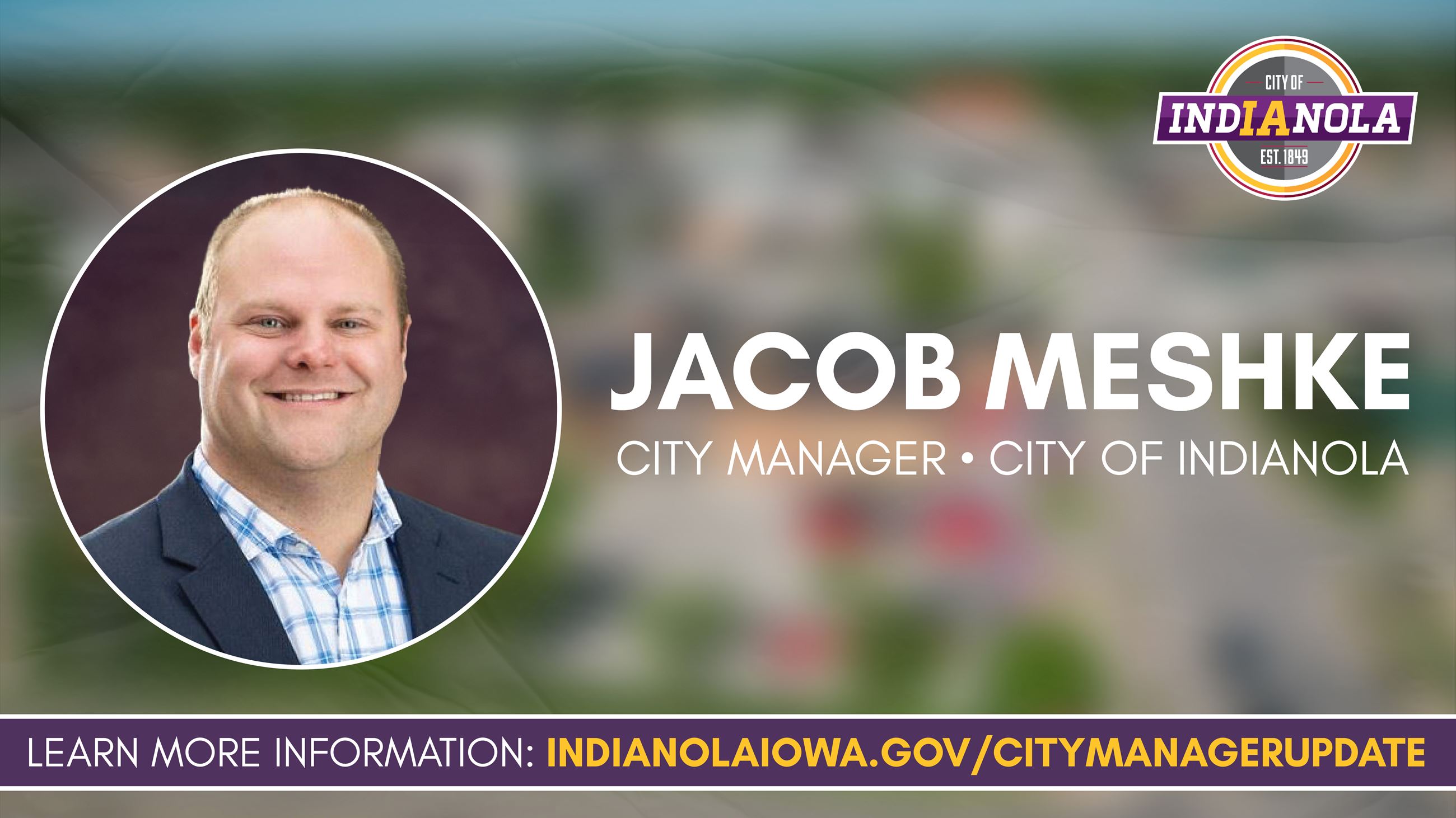 A photo of a man in a suit announcing the hiring of Indianola's next city manager, Jacob Meshke.
