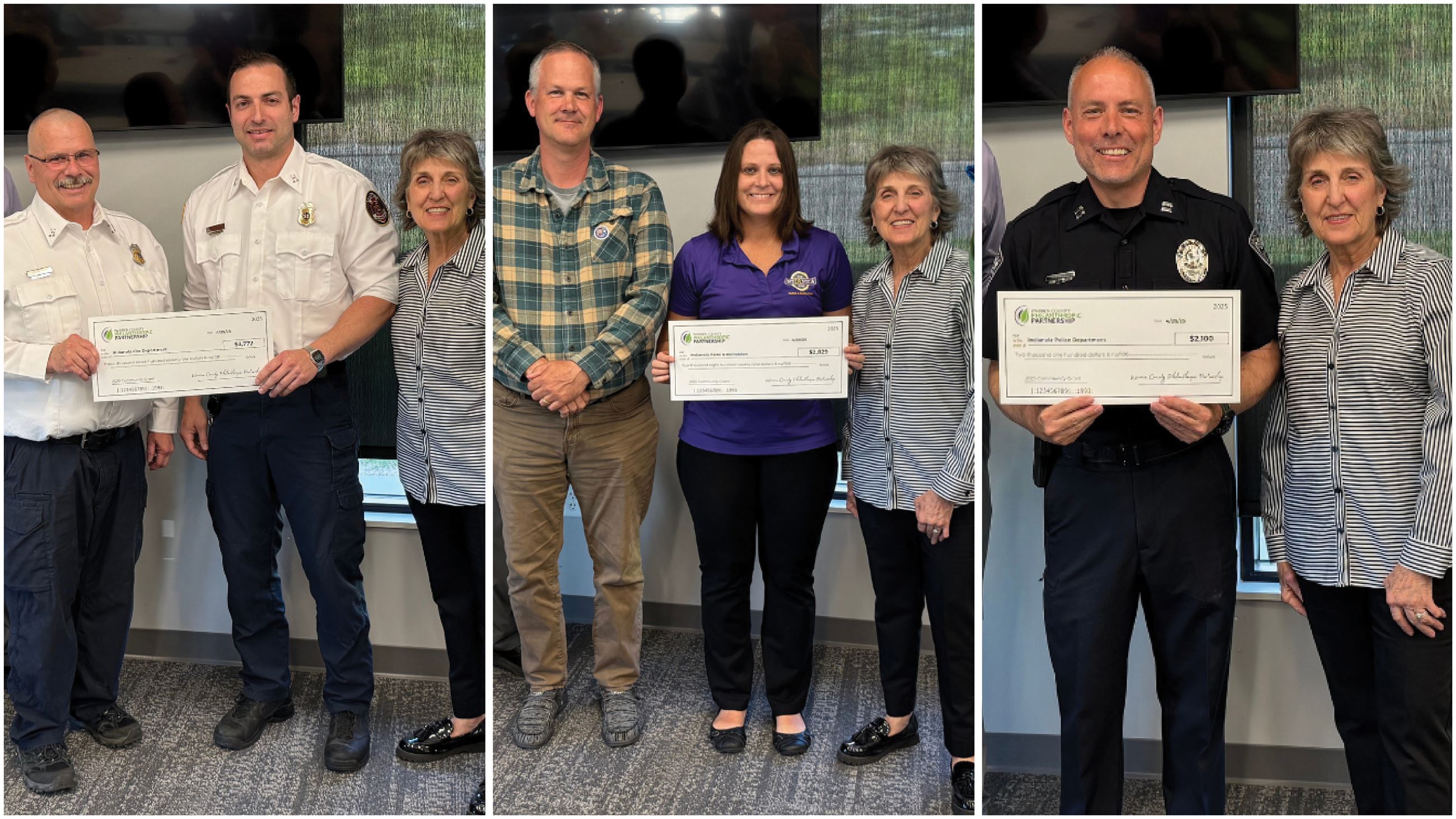 Groups of people standing and holding checks.
