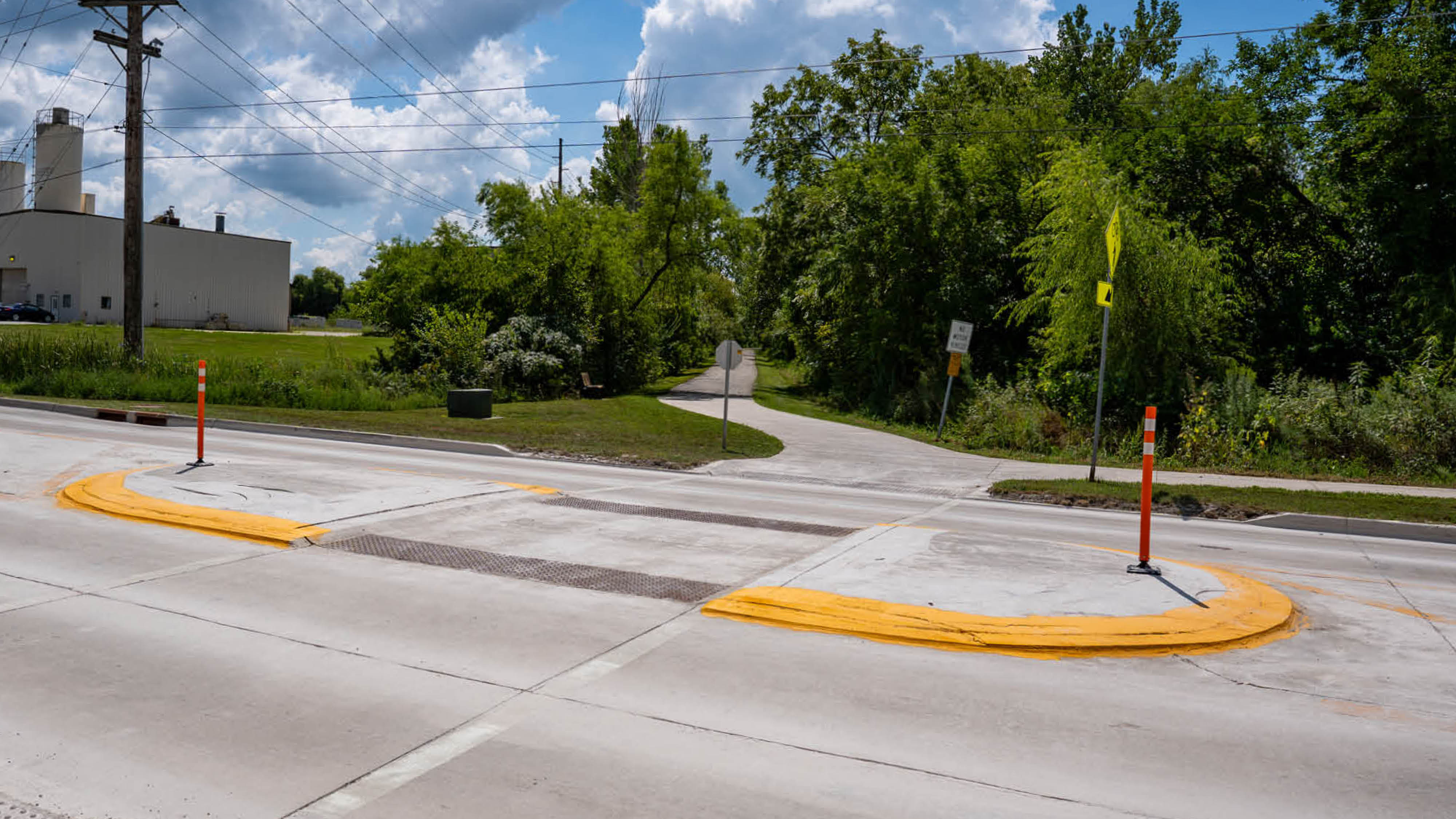 The Hillcrest Avenue median was grounded and included orange flex posts and refreshed yellow paint.