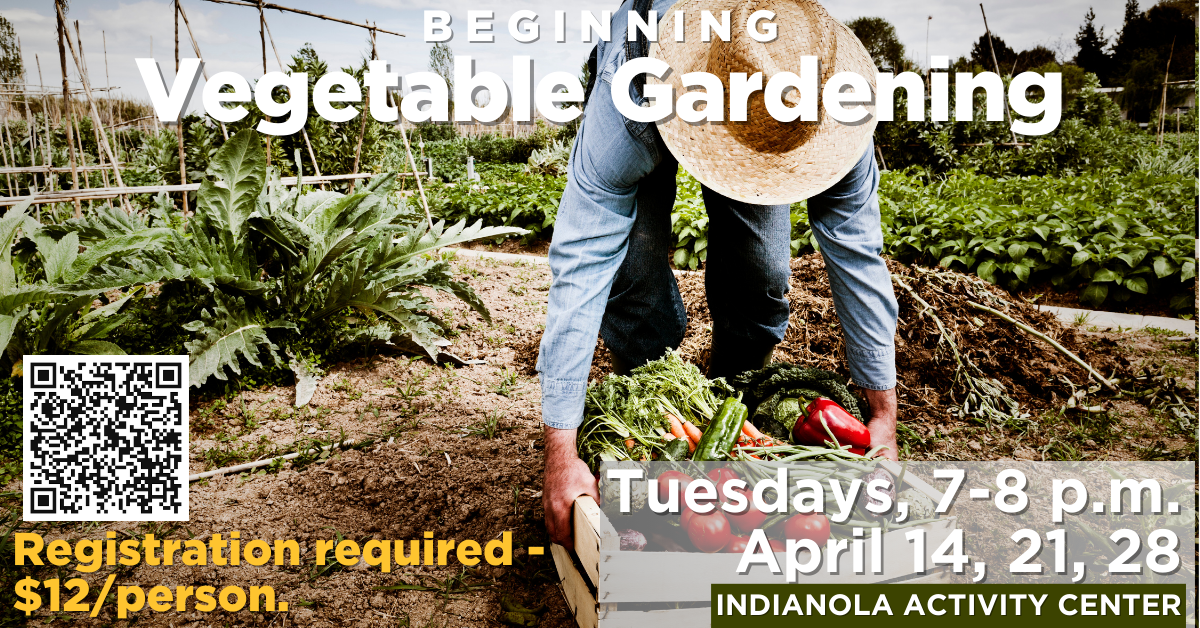 A gardener in a straw hat picks up a box of fresh vegetables