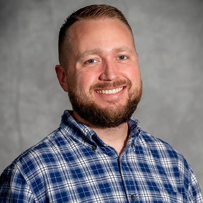 Senior Planner Bill Mettee smiles for a portrait photo.