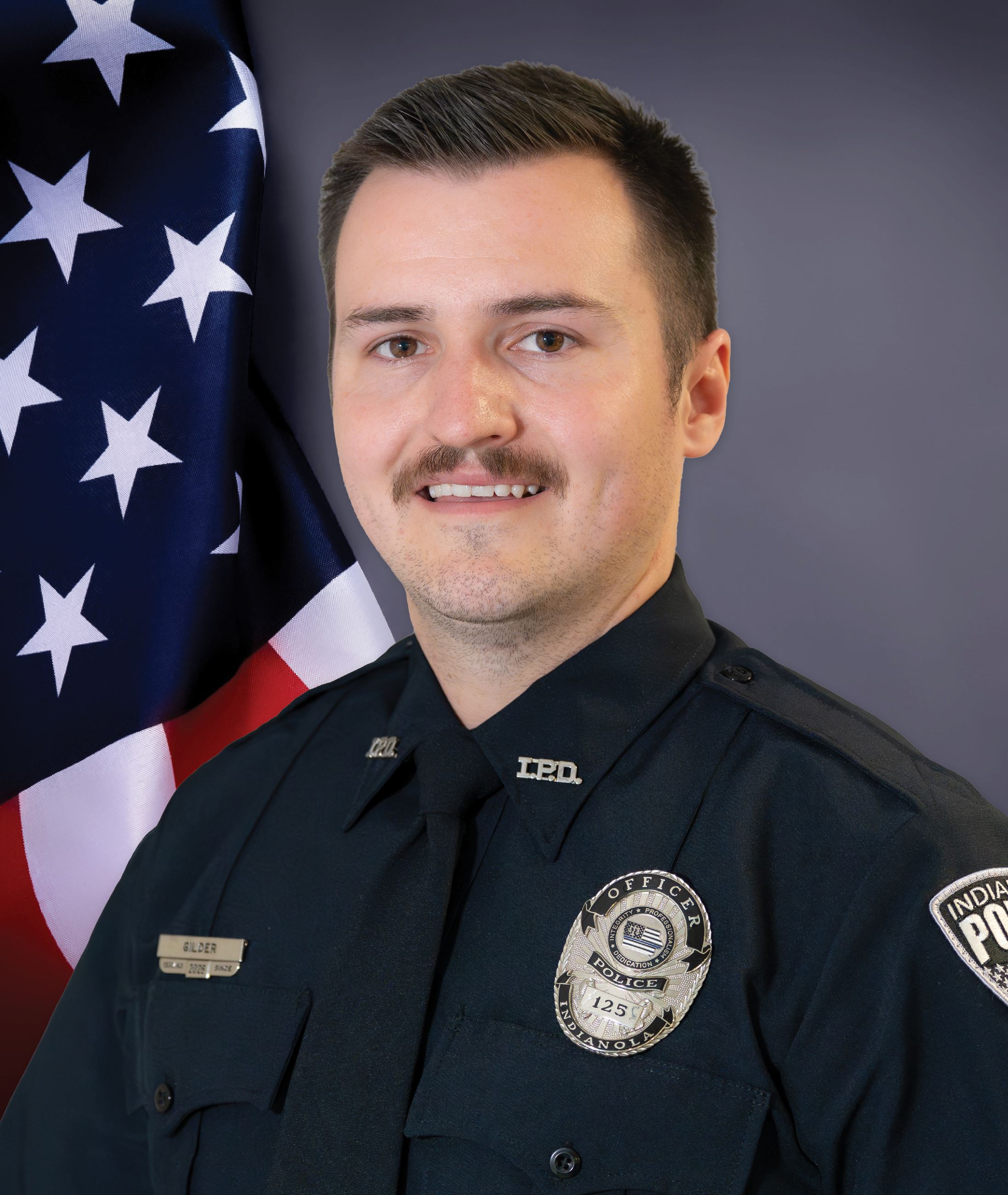 A portrait photo of Indianola Police Officer Luke Gilder