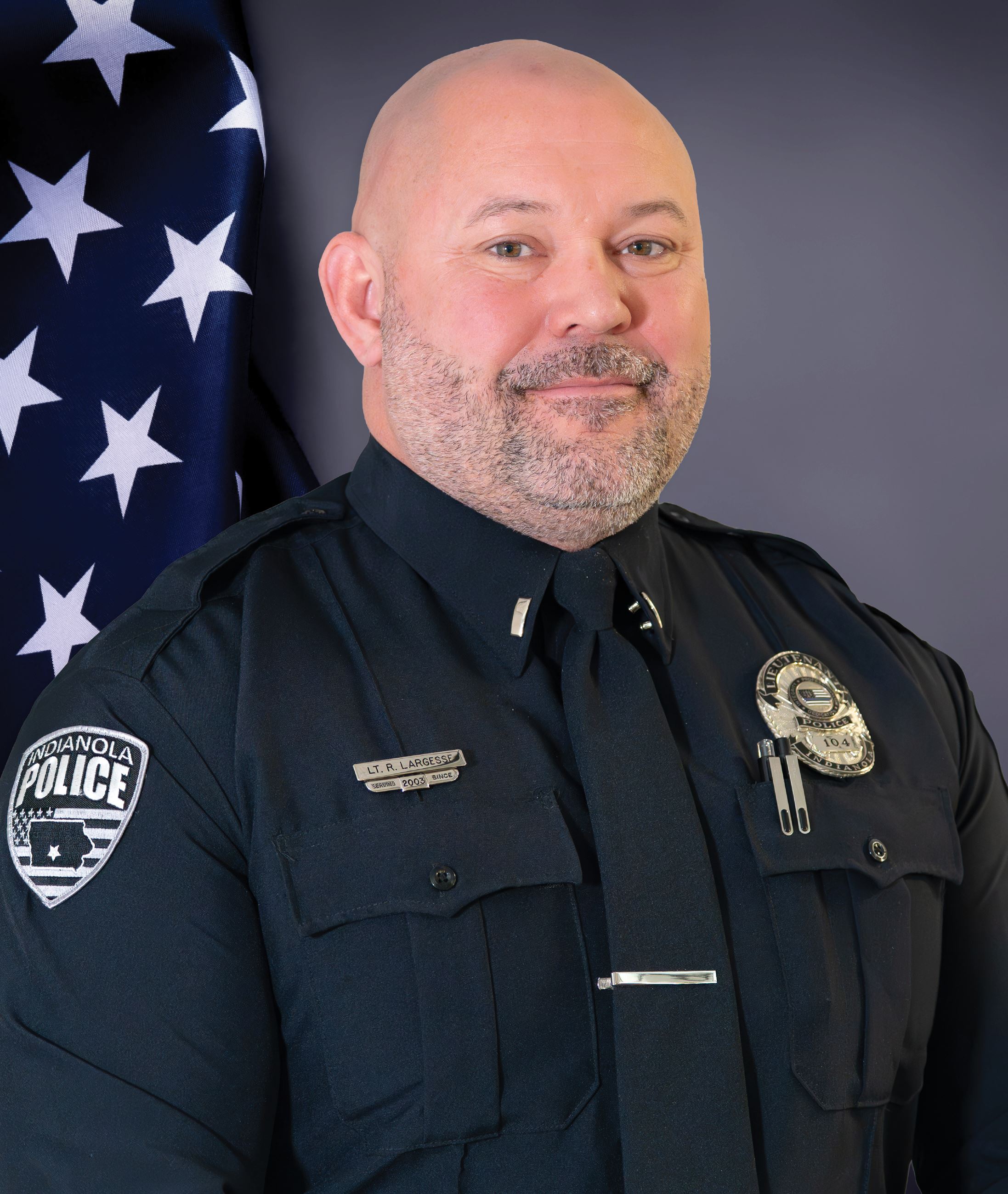 A portrait photo of Indianola Police Lieutenant Rick Largesse.