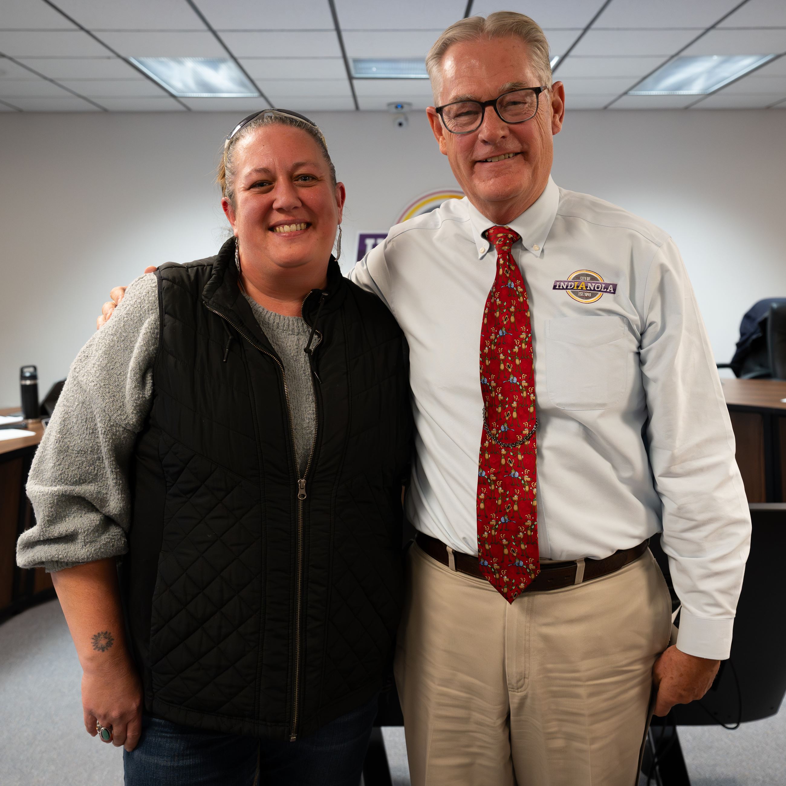 Christina Beach and Indianola Mayor Steve Richardson pose for a photo.