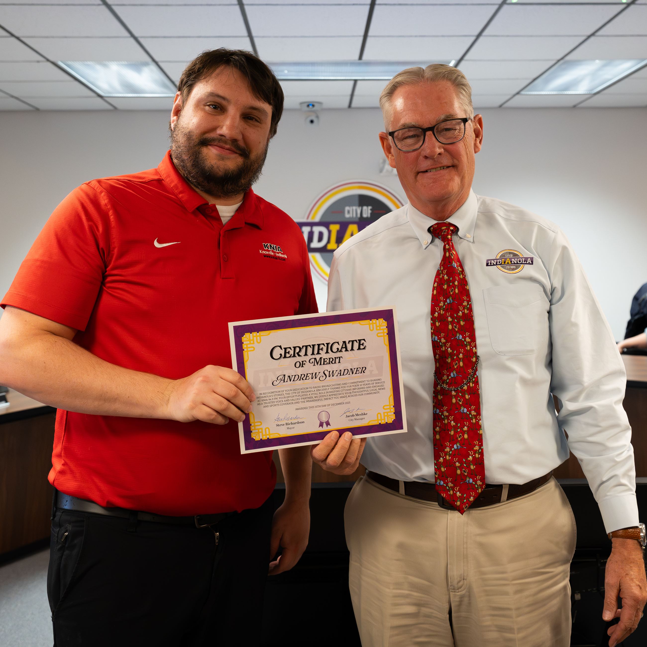 Andrew Swadner poses for a photo with Indianola Mayor Steve Richardson 